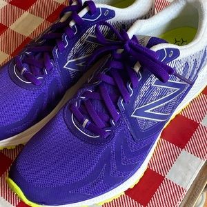 Womens New Balance 9.5 size Purple Shoe.  Like New